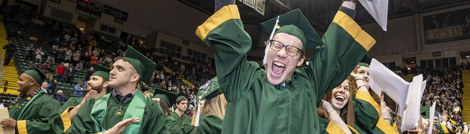 photo of a happy graduate at commencement at wright state
